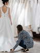 Атласное свадебное платье с разрезом и декольте Sola. Силуэт А-силуэт. Цвет Белый / Молочный. Вид 7