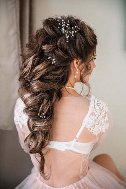 Эффектные свадебные косы: создание изысканных образов невесты